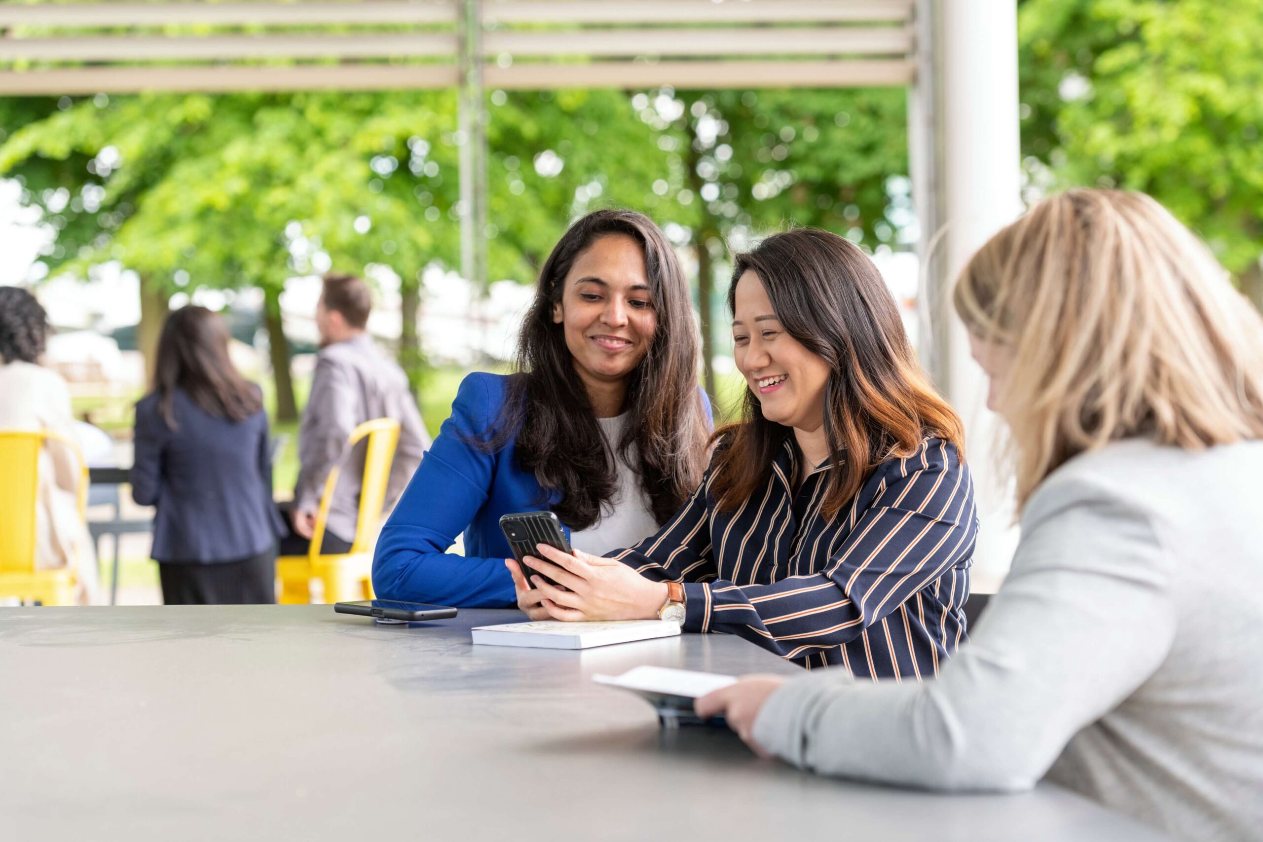 Three entrepreneurs discussing their business ideas
